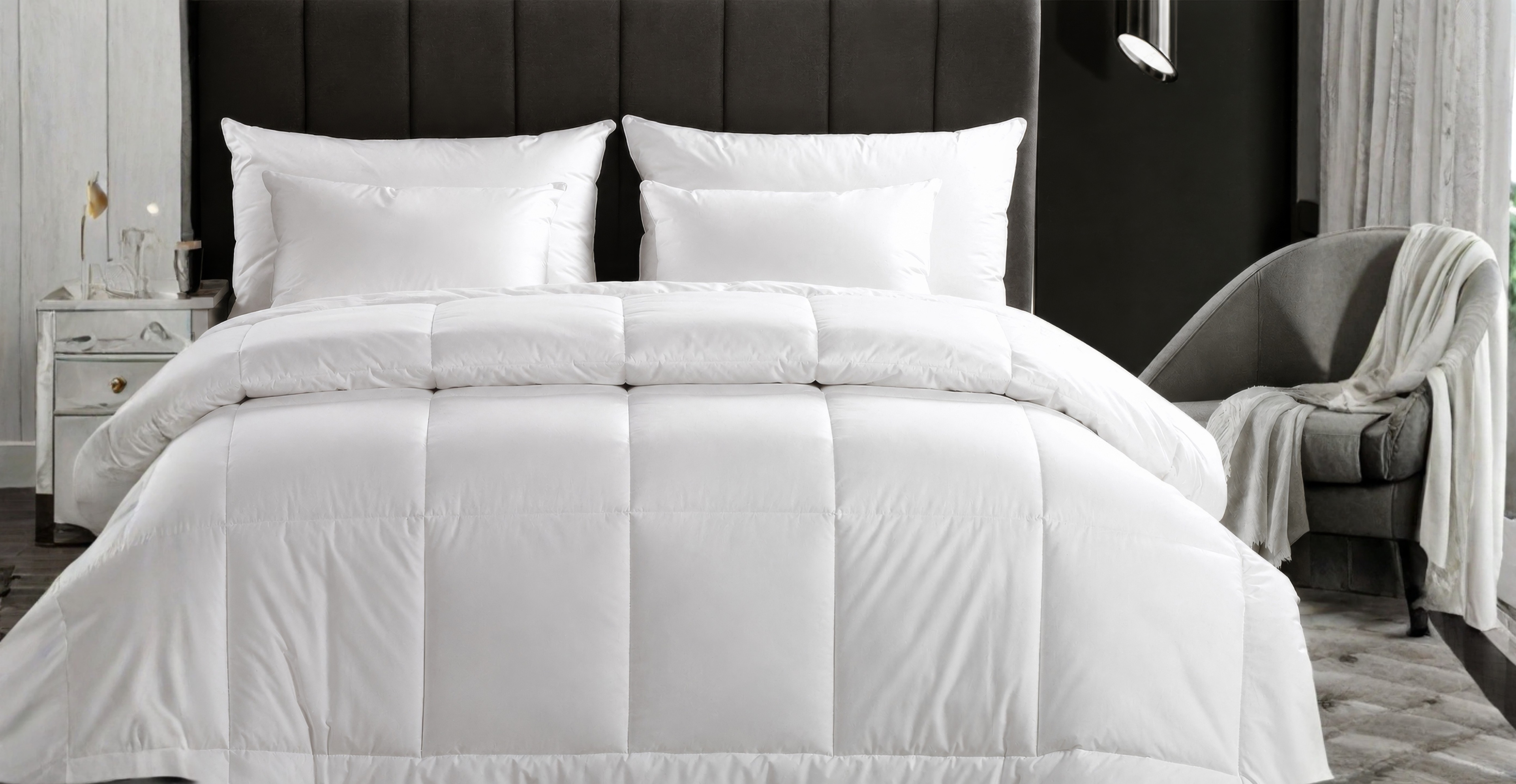 Hotel-style bed dressed in crisp white NUVELL bedding